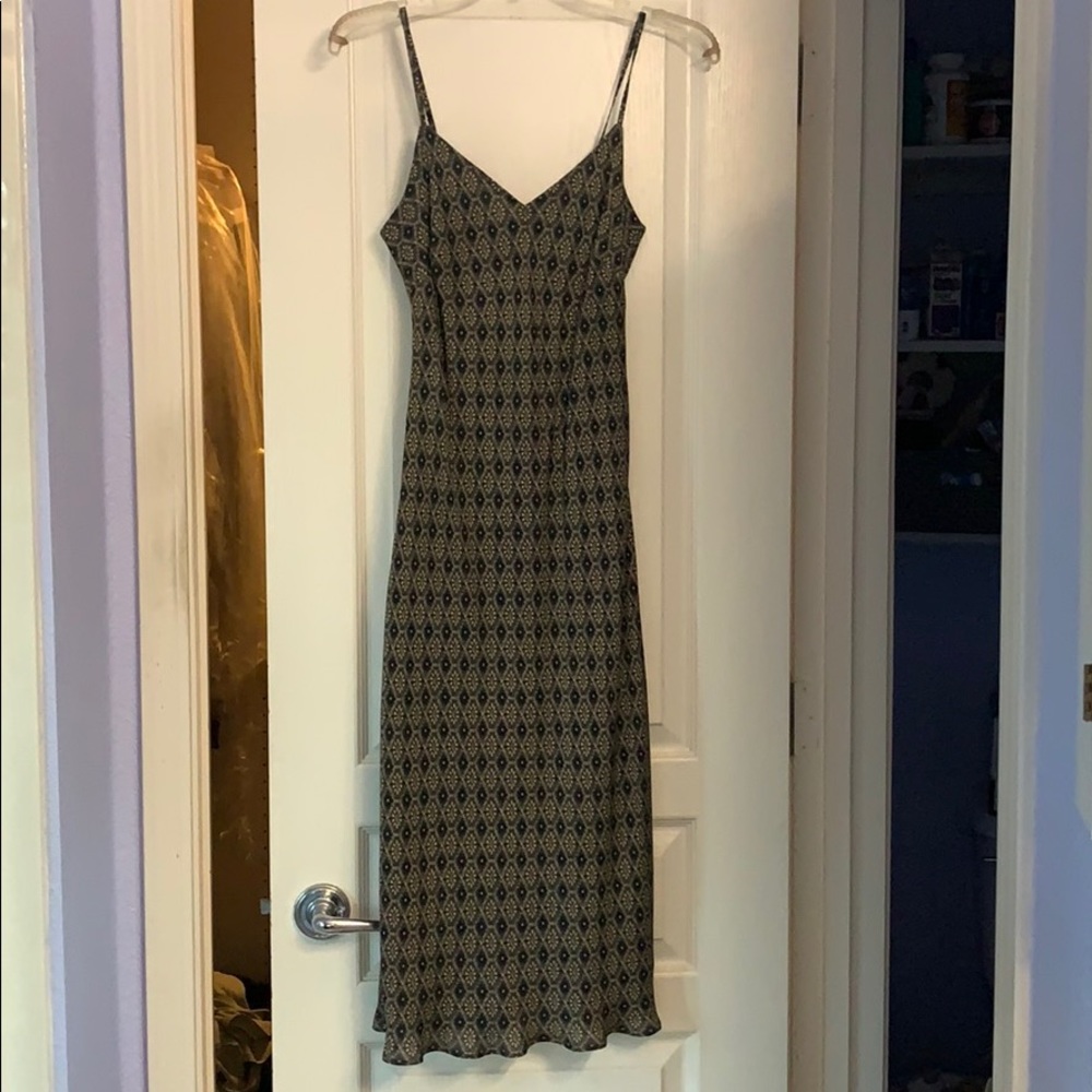 Fitted and flowy shin-length slip on dress